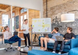 A marketing team discussing what does bottom of the funnel m