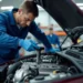 mechanic using smart fastener to check car machine