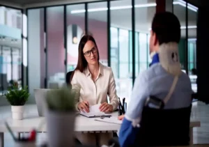 professional consultation meeting between advisor and client in modern office