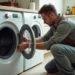 Handyman fixing a washing machine