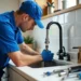plumber repairing home plumbing system with professional tools and expertise