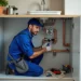 professional plumber upgrading residential plumbing system for better performance