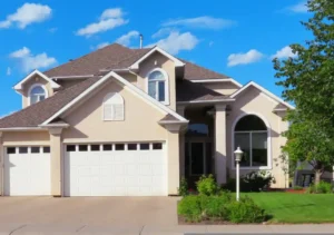 large modern suburban home with garage and landscaped yard